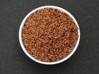 Flax seeds in a bowl top view 