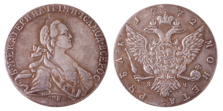 Russian silver coin with a value of 1 ruble in 1772. Two sides of the coin on a white background. Isolated