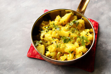 Indian boiled mashed potatoes curry or sabzi. Alu ki sukhi sabzi. Also known as Batatyachi suki...