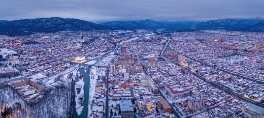 Panoramic aerial view of Vladikavkaz on cloudy winter morning. North Ossetia, Russia.