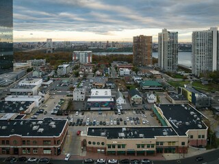 Aerial view of modern buildings and streets in Fort Lee, New Jersey at sunset