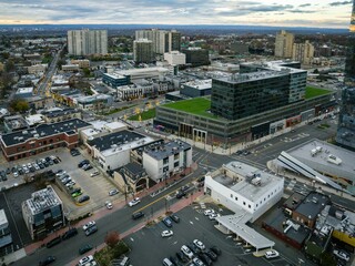 Aerial view of modern buildings and streets in Fort Lee, New Jersey at sunset