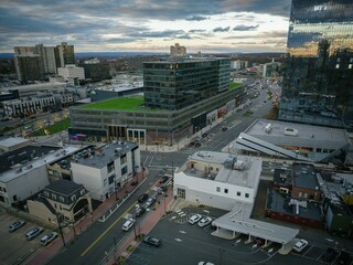 Aerial view of modern buildings and streets in Fort Lee, New Jersey at cloudy sunset