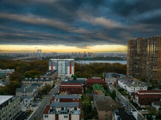 Aerial view of modern buildings and streets in Fort Lee, New Jersey at cloudy sunset
