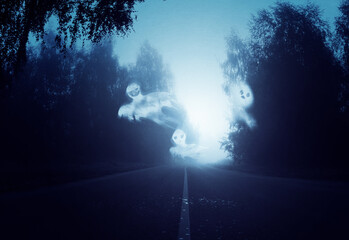 Night foggy forest road and ghosts