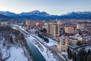 Aerial view of Sunni Mosque and Terek embankment at winter sunrise. Vladikavkaz, North Ossetia, Russia.