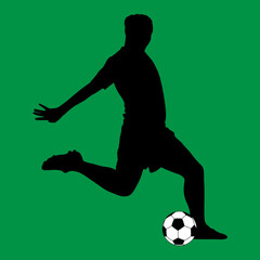 Fototapeta na wymiar silhouette of a soccer player kicking the ball