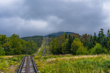 The world's first cog railway in the White Mountains of New Hampshire leading from the base station to the top of Mount Washington