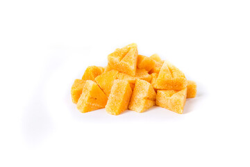 Saffron spiced sugar cubes in a pile isolated over white