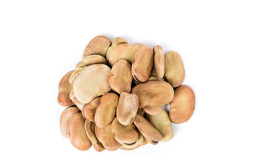 Fava bean heap isolated over white background top down view