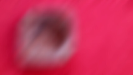 Abstract blurred background with red as the main composition, there is also a bit of black and white.