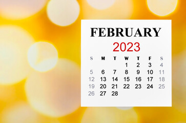 The 2023 February calendar is the month for the organizer to plan 2023 year on blurred bokeh...