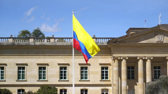 South America, Colombia Bogota 2022 - Bolivar square in downtown of the city - flag in the seat of the Colombian parliament politic and the residence of the president of the republic in Plaza de Núñez