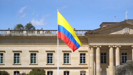 South America, Colombia Bogota 2022 - Bolivar square in downtown of the city - flag in the seat of the Colombian parliament politic and the residence of the president of the republic in Plaza de Núñez - obrazy, fototapety, plakaty