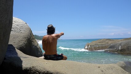 40 years old man arrives to the beach in the Caribbean sea ocean - relax physical and mental...