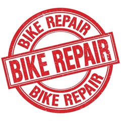 BIKE REPAIR written word on red stamp sign