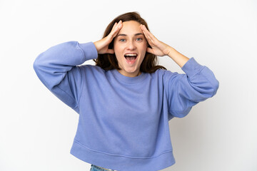 Fototapeta premium Young caucasian woman isolated on white background with surprise expression