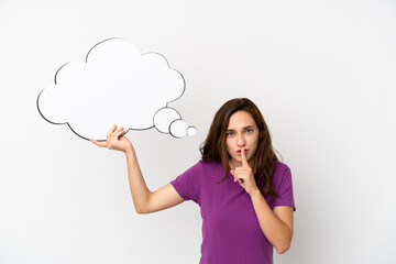 Young caucasian woman isolated on white background holding a thinking speech bubble and doing silence gesture
