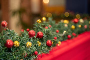 Fototapeta na wymiar Christmas Ornament Decorations on the Red Veil