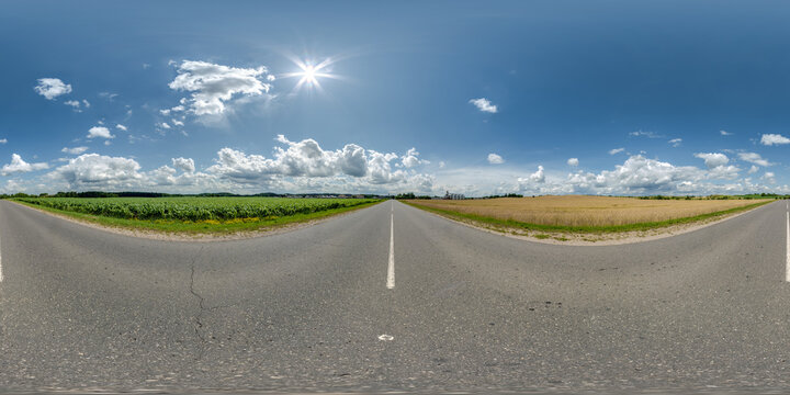 full seamless spherical hdri 360 panorama view on no traffic asphalt road among fields with overcast sky and white clouds in equirectangular projection,can be used as replacement for sky in panoramas