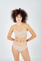 Undressed female model with My Body My Rules inscription