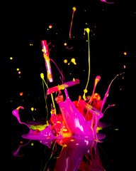 Naklejka premium Paint splashes on black background