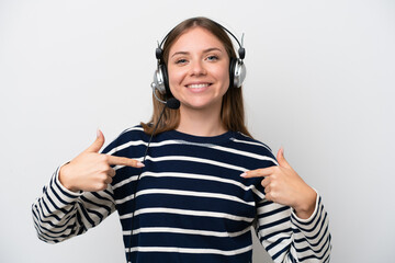 Telemarketer caucasian woman working with a headset isolated on white background proud and self-satisfied