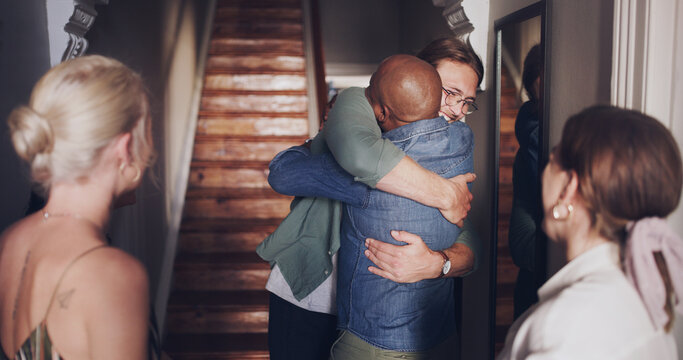 Hug, Love And Friends Meeting At A Reunion, Home Support And Social Celebration At A Housewarming. Diversity Welcome, Affection Greeting And Men And Women Hosting A Party To Celebrate Friendship