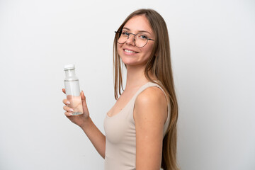 Young Lithuanian woman with a bottle of water isolated on white background smiling a lot