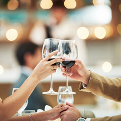 Red wine, hands and date with a couple toast in a restaurant for the celebration of an anniversary....