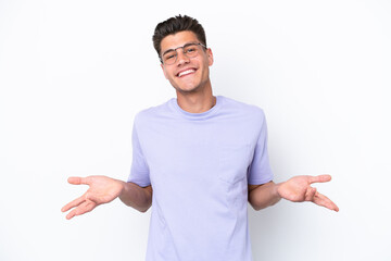 Young caucasian man isolated on white background happy and smiling