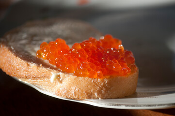 Naklejka na ściany i meble red caviar on a piece of bread