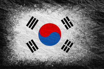 Naklejka premium Flag of South Korea. Flag is painted on black crumpled paper. Paper background. Copy space. Textured background