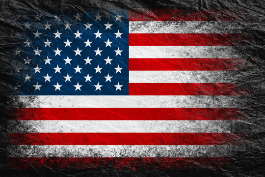 Flag of USA. Flag is painted on black crumpled paper. Paper background. Copy space. Textured background