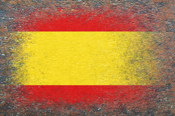 Flag of Spain. Flag painted on rusty surface. Rusty background. Copy space. Textured background