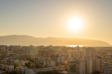 Attractive spring cityscape of Vlore city from Kuzum Baba. Captivating sunset sescape of Adriatic sea. Spectacular outdoor scene of Albania, Europe.