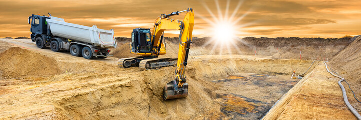 excavator is working and digging in construction site