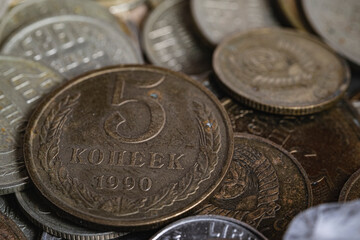 Soviet and russian coins close-up. A bunch of coins. Coins of the USSR with a denomination of 3 kopecks and 2 kopecks, 15 kopecks, 