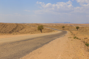 Namibian landscape along the gravel road. Namib-Naukluft National Park, Namibia.