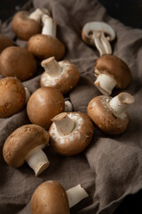 Close up of Raw fresh shiitake mushrooms  on textile vegan food