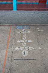 game of Hopscotch, rayuela,  graffiti on the concrete.
