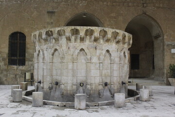 
Mardin Ulu Mosque, its fountain, minaret, window, door and inscriptions on it, Mardin Turkey