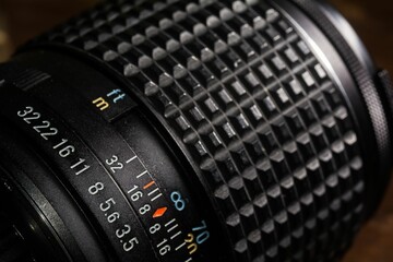Close-up of a vintage black camera and the lens indicators