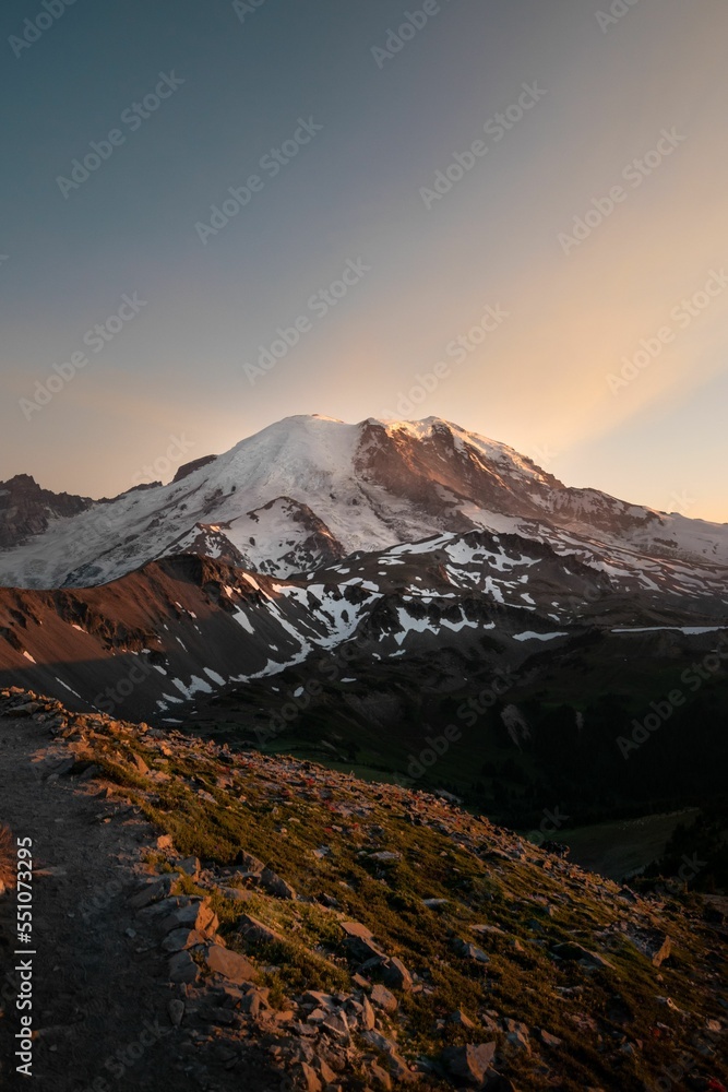 Canvas Prints Vertical shot of the beautiful soft pink sunset over the snowy Mount Rainier