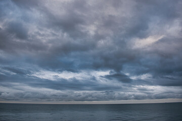 Naklejka na ściany i meble clouds over the sea