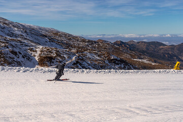 Person snowboarding in Sierra Nevada