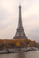 Views of the Eiffel Tower from bridge over the Seine River.