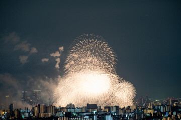 View of fireworks during a summer festival with a clear sky night (Toyonaka, Osaka, Japan) (20221203-016)