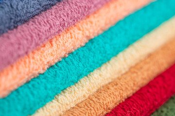 multi-colored Terry cotton bath towels, isolate on a white background
