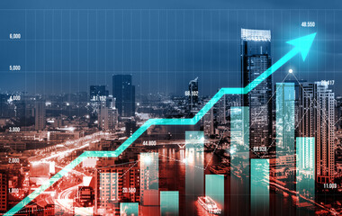 Financial graphs and digital indicators overlap with modernistic urban area, skyscrabber for stock market business concept. Double exposure.